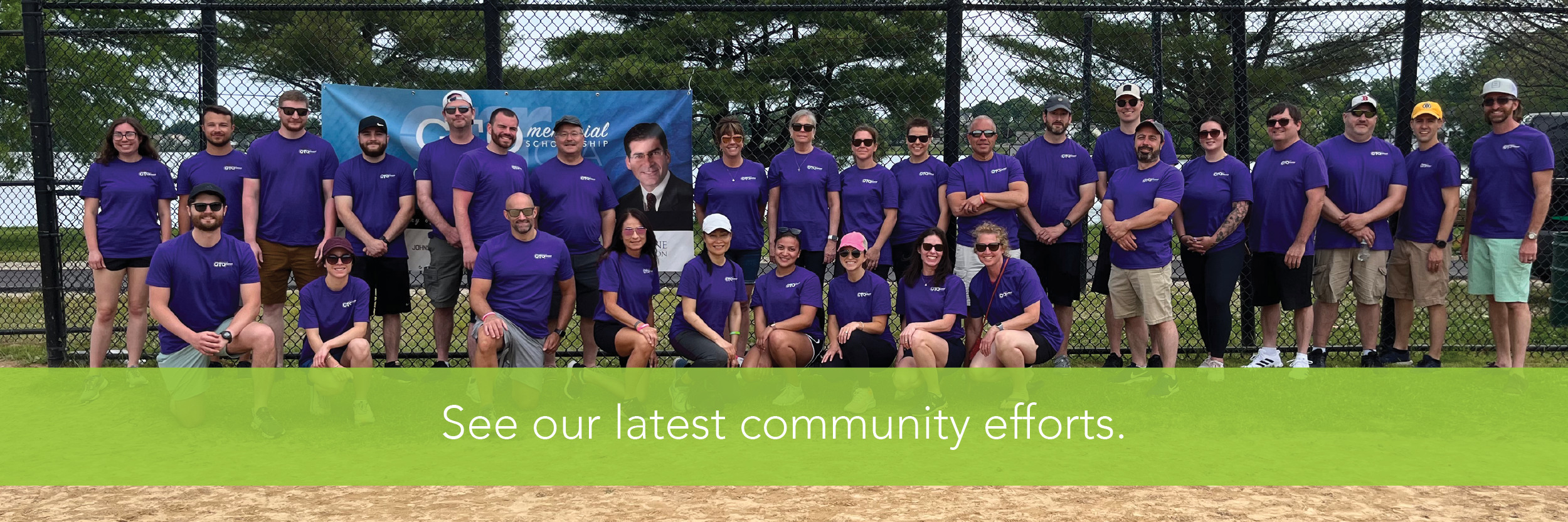 Team photo with caption: See Our Latest Community Efforts
